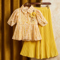 Designer Daisy Delight: Peplum Blouse & Sunburst Pleated Palazzo Set